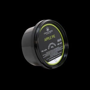 Barattolo Crystalweed “Apple Pie” da 10 g per infiorescenza CBD su sfondo nero.